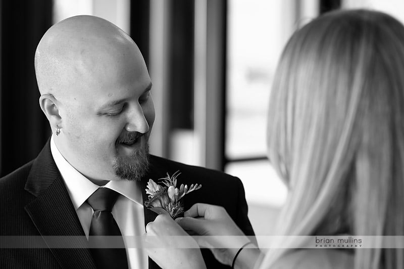 groom getting boutannaire pinned