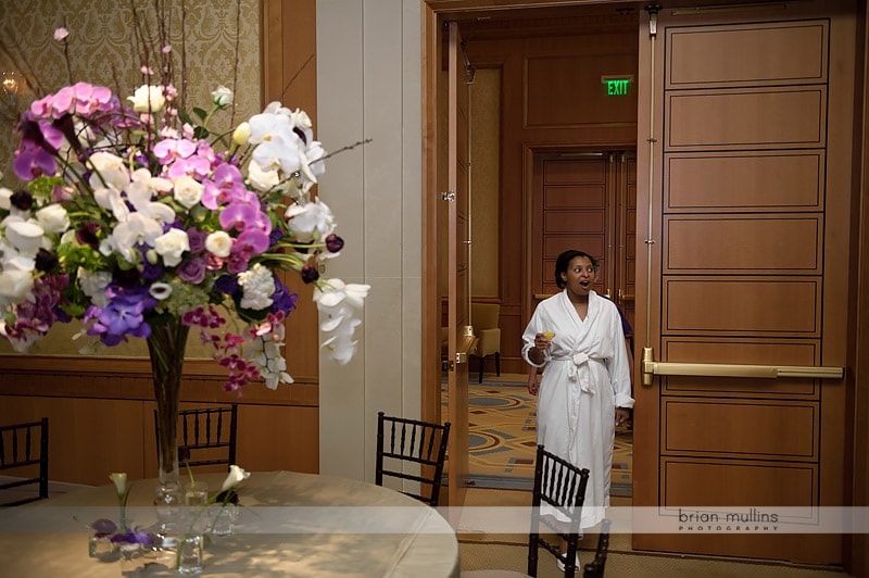 bride sees wedding reception room