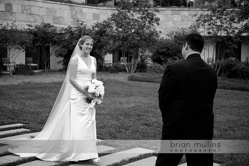 bride and groom see each other at wedding