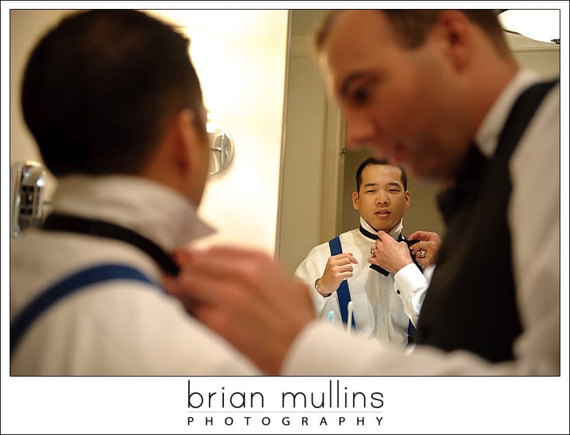 Groom getting ready at the Umstead hotel