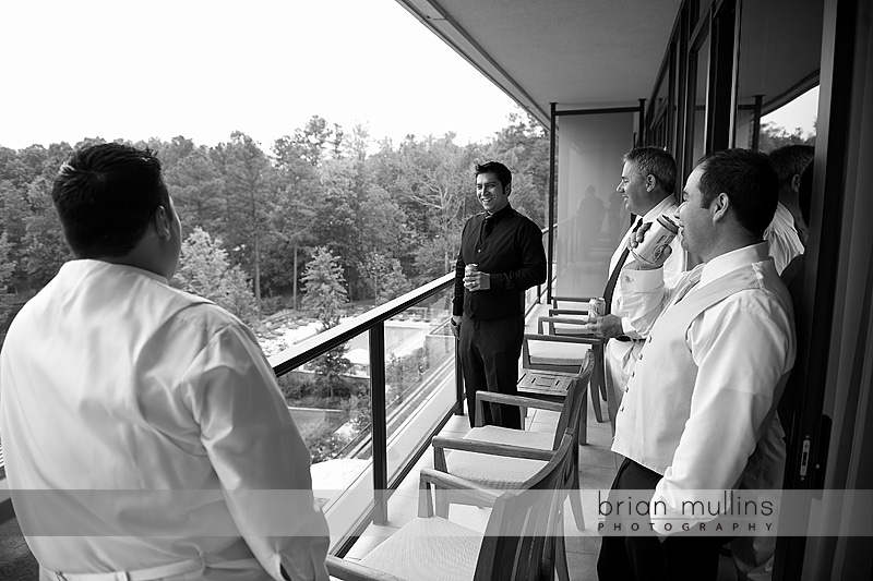 groomsmen on Umstead Hotel balcony