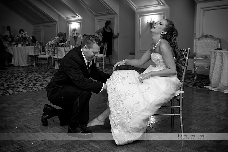 groom removing garter