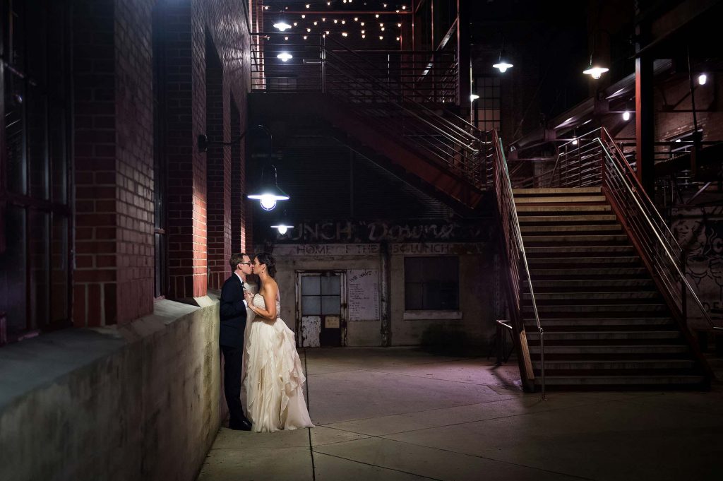 evening wedding portrait in urban environment