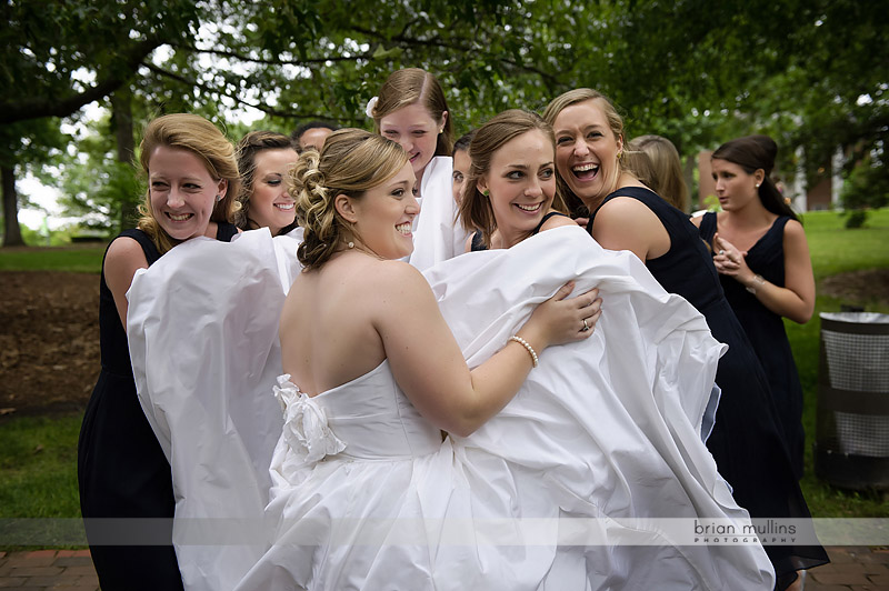 bridesmaids keep warm at mciver amphitheater