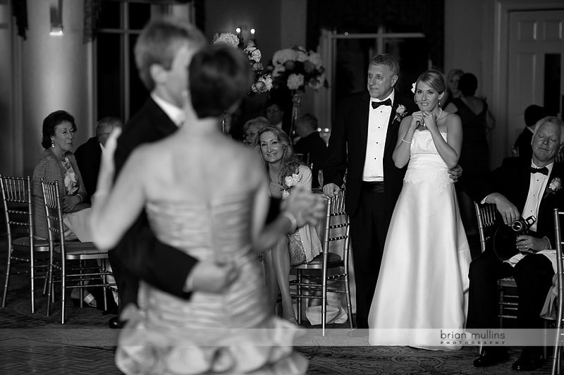 bride crying during parents dance