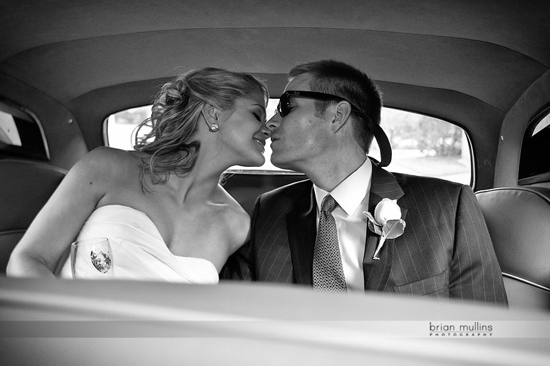 bride and groom in rolls royce