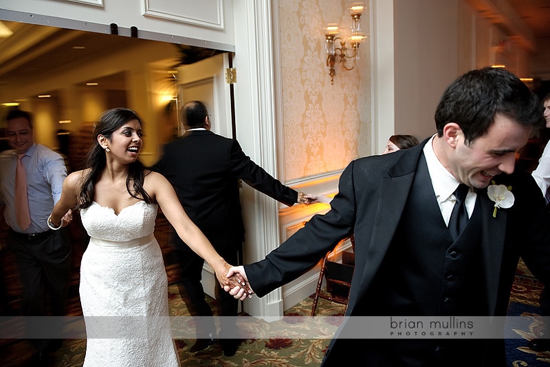 bride & groom running