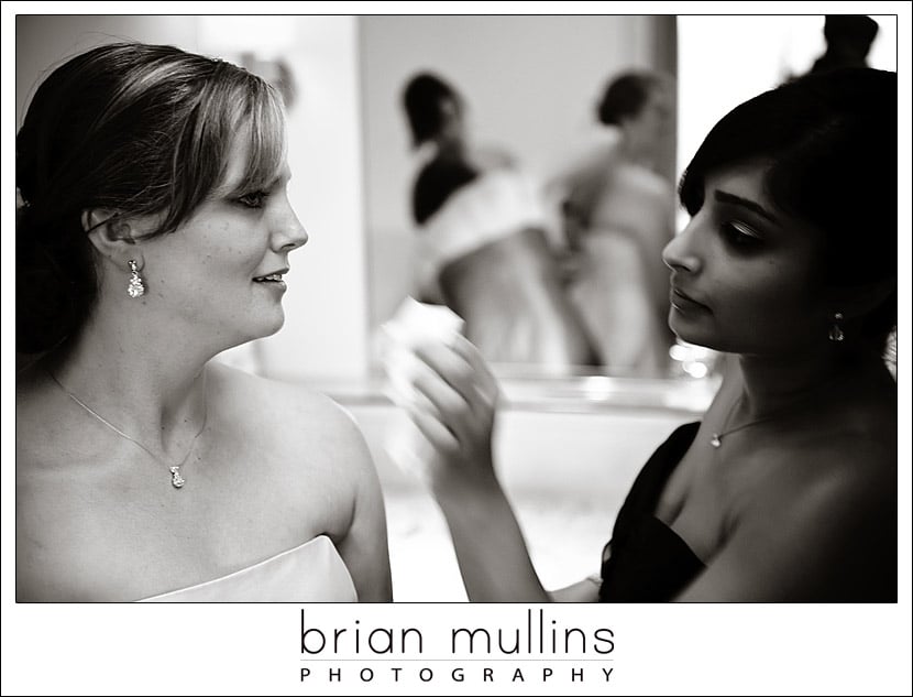 bride getting the final touches before her wedding