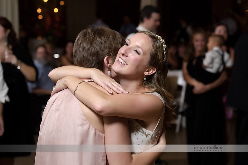 bride hugging friends