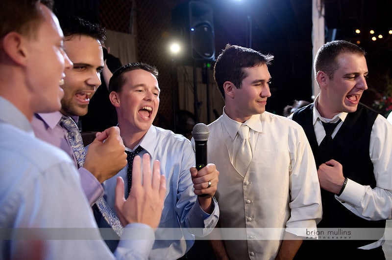 groomsmen singing at fearrington wedding