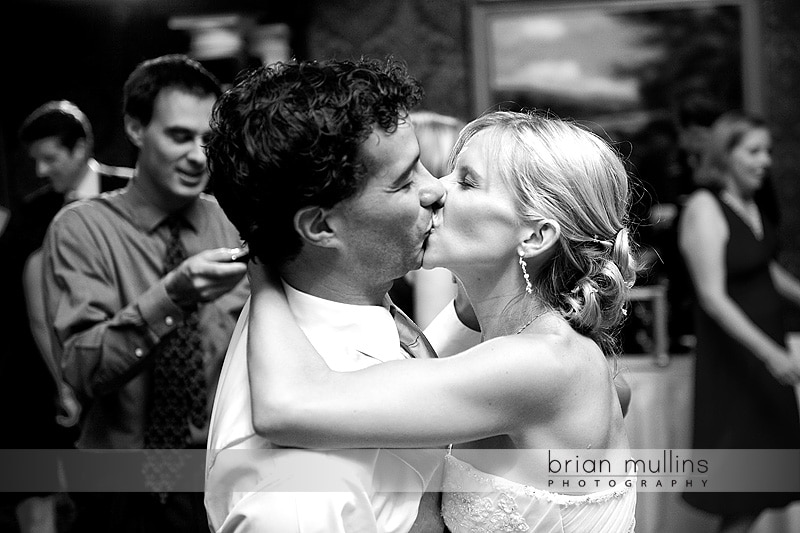 Bride and groom kissing