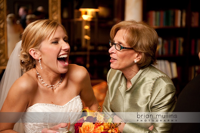 Bride laughing at wedding reception