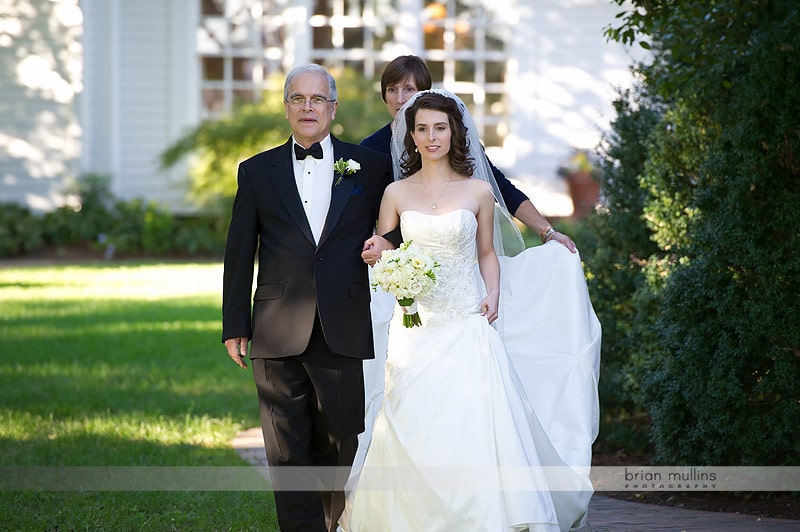 father walking bride down the aisle