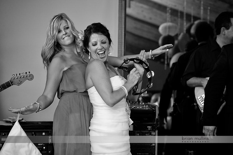 bride and bridesmaid dancing