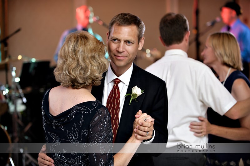 grooms parents dancing at wedding reception