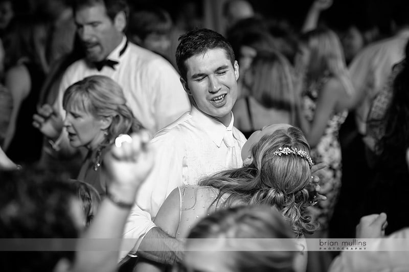 groom dancing at wedding reception
