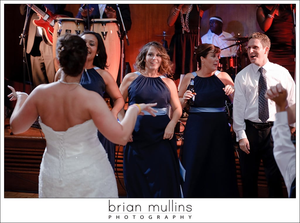 Bride dancing with her bridesmaids at the Carolina Club