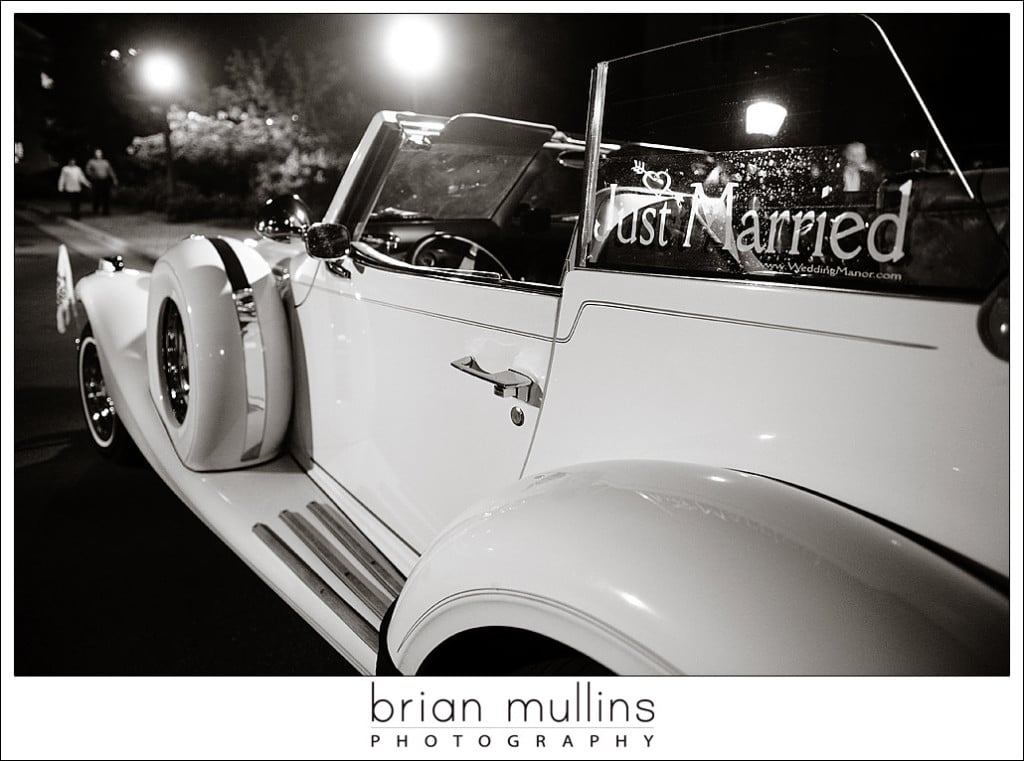 white excalibur wedding car at the Carolina Club