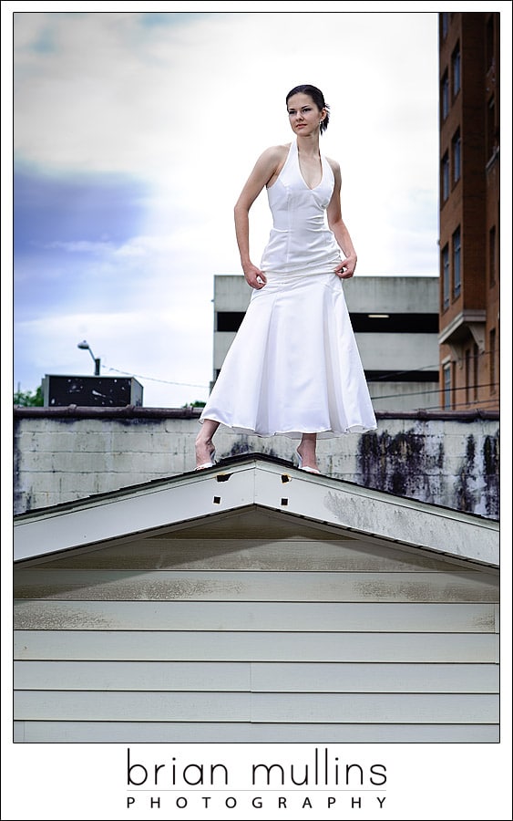 bride standing on roof - Raleigh Wedding Photography