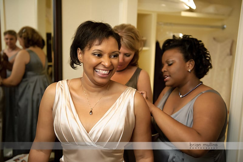 bride changing wedding dress