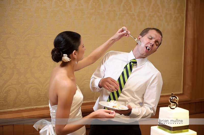 wedding cake smashed into grooms face