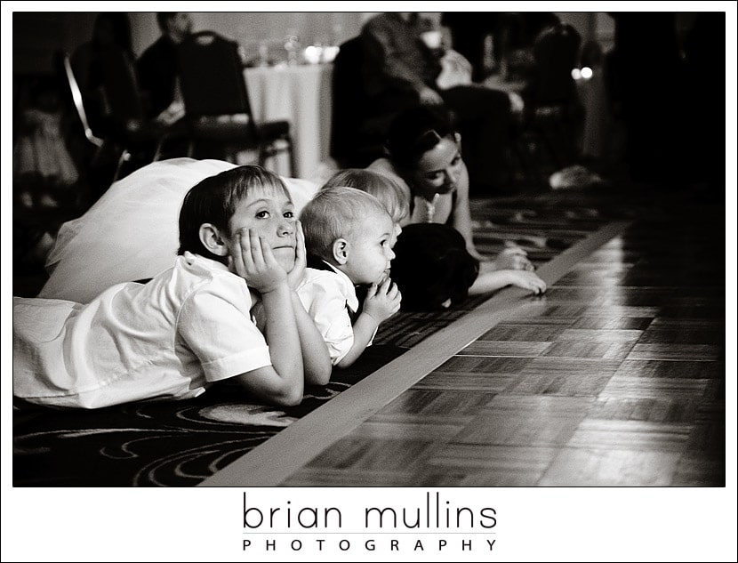 Kids watching the dance floor at wedding reception