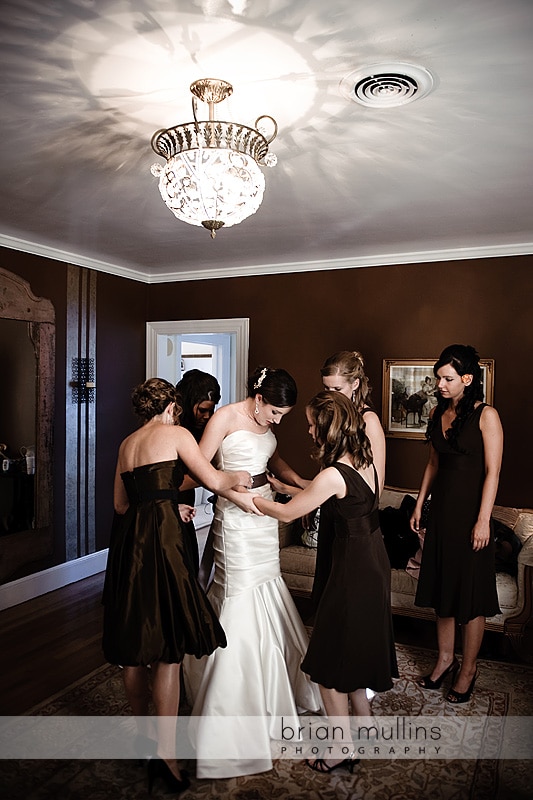 Raleigh Wedding Photography - bride putting on dress
