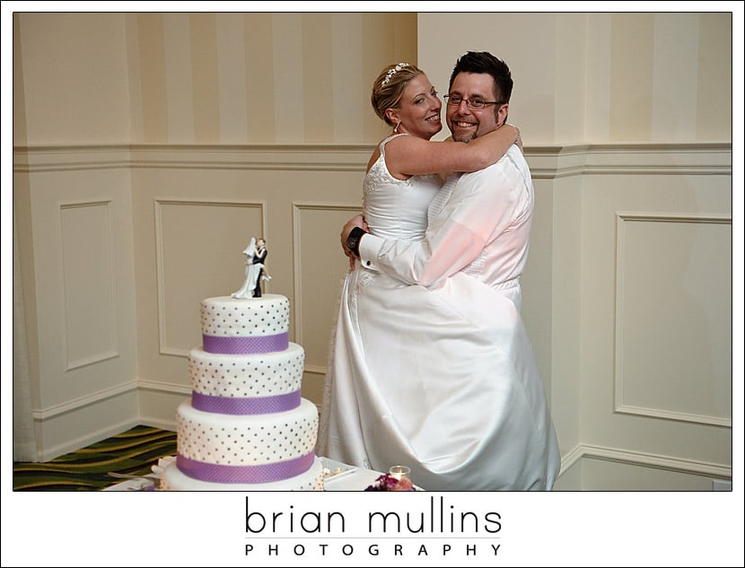 bride imitating the wedding cake topper