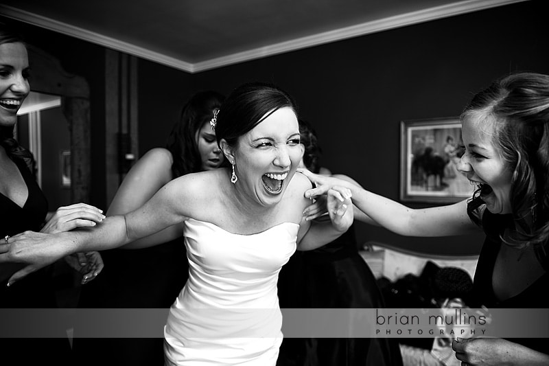 Raleigh Wedding Photography - bride putting on dress