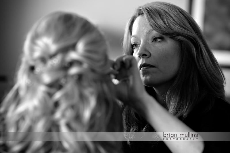 bride getting hair and makeup