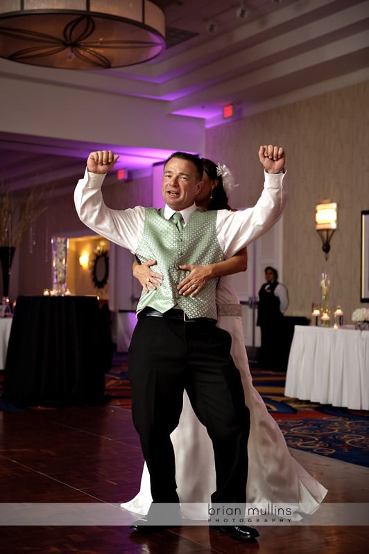 groom dancing at wedding