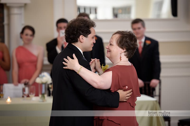 mom dancing with groom