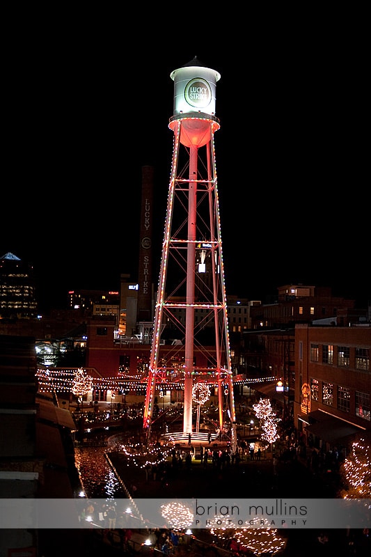photograph of water tower lighting