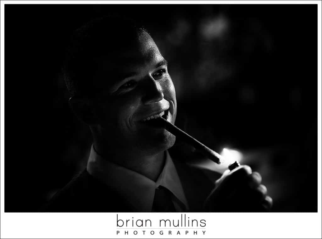 Groom enjoying a cigar - Cary Wedding Photographer