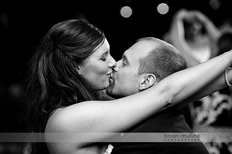 bride and groom kissing