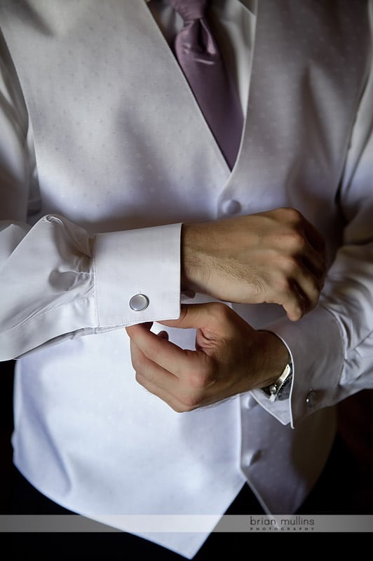 details of groom getting ready