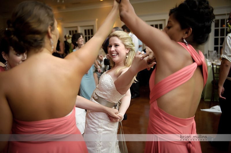 bride dancing with friends