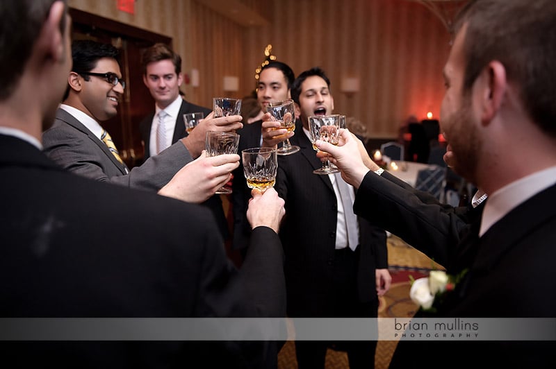 guys toasting at wedding