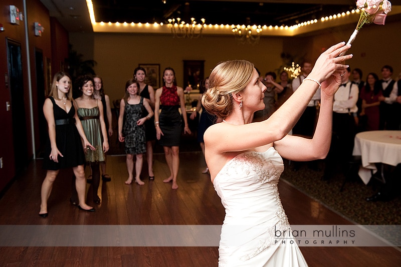 bouquet toss at wedding reception