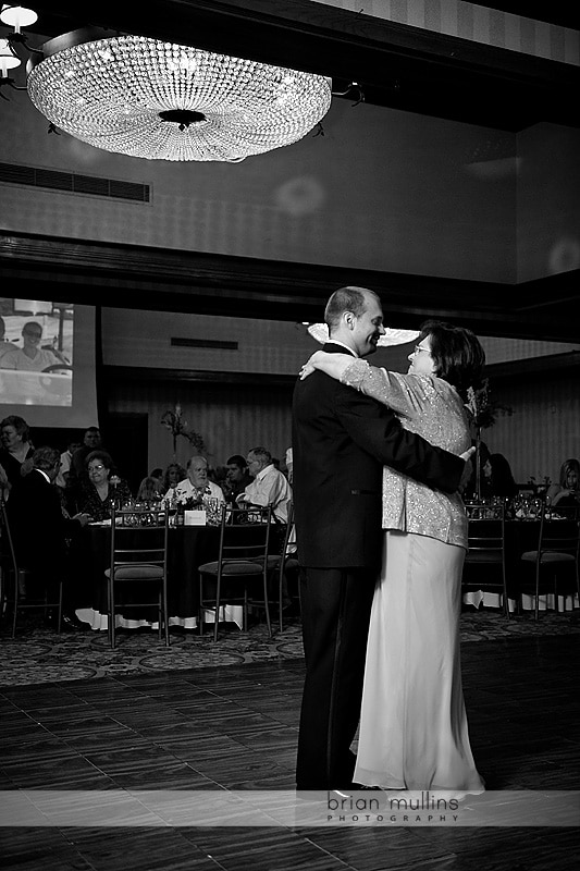 groom dancing with mother