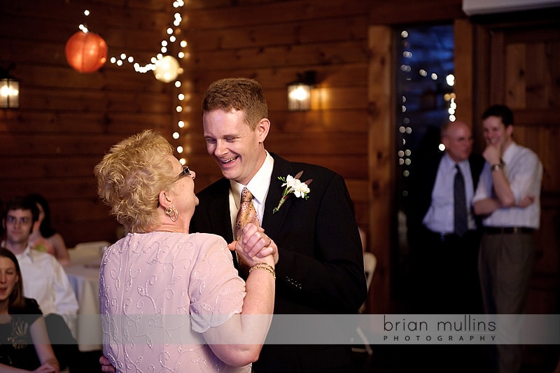 groom dancing with mother